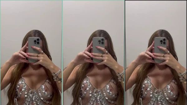 Nayara Macedo gravando seu corpo com o celular